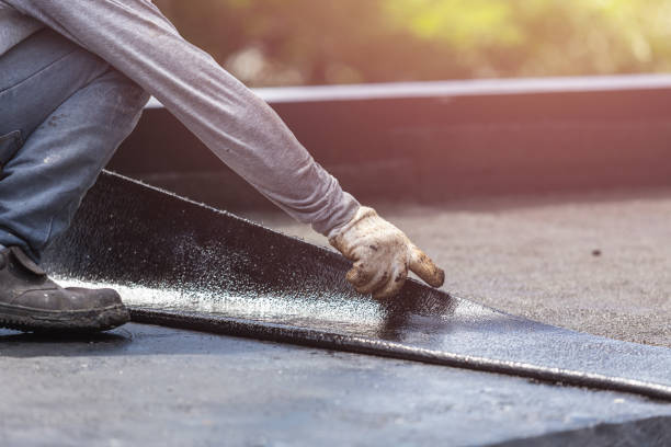 Professional Basement Waterproofing technician working in Minneapolis, MN